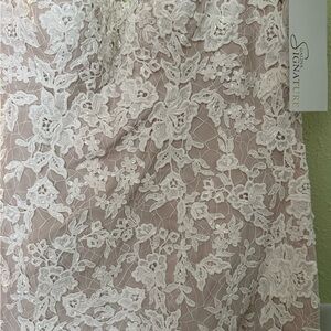 Never worn, never altered size 8 wedding dress!